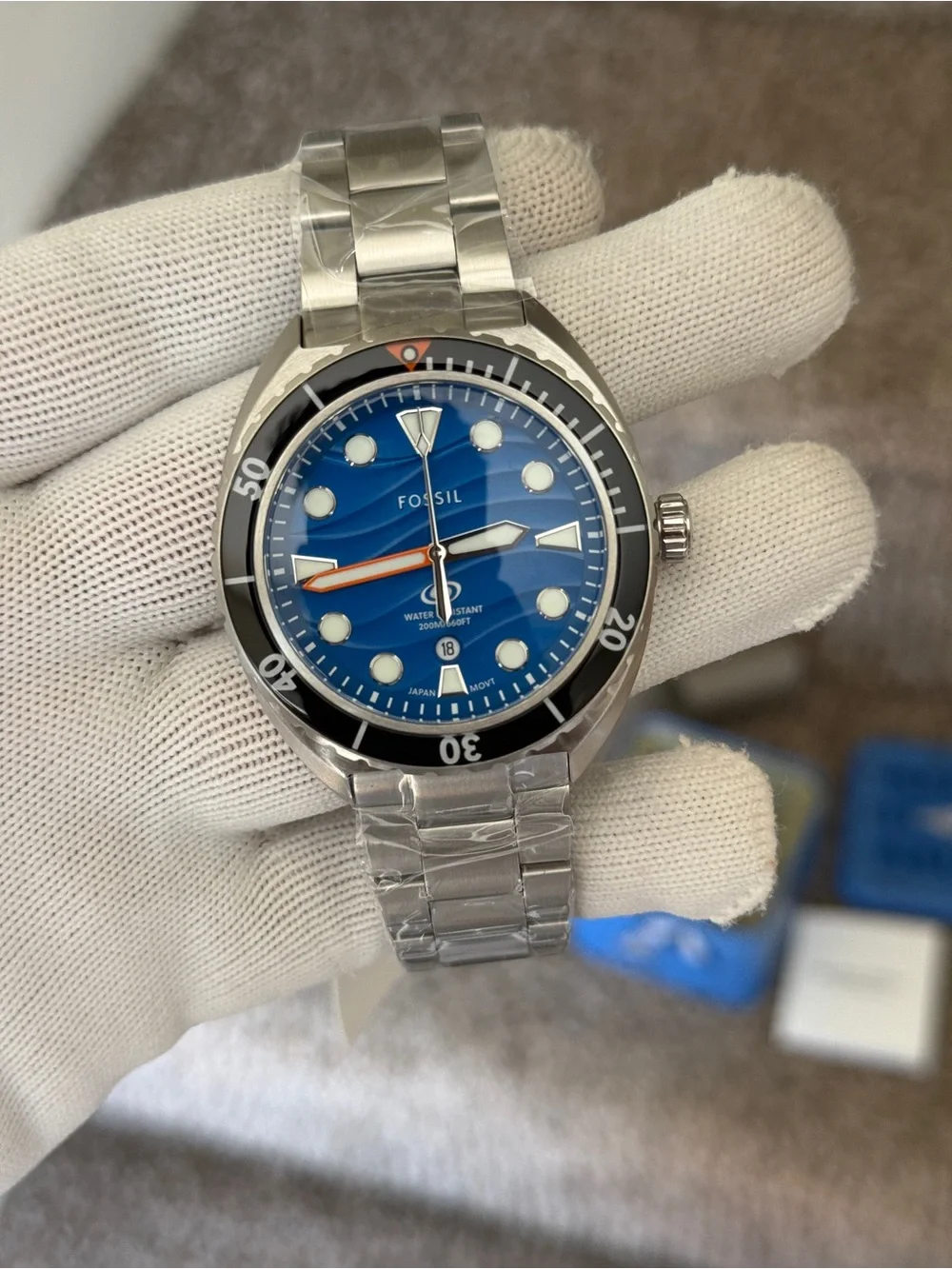 Fossil Men’s Blue Wave Dial Stainless Steel Swim Watch with Black Bezel